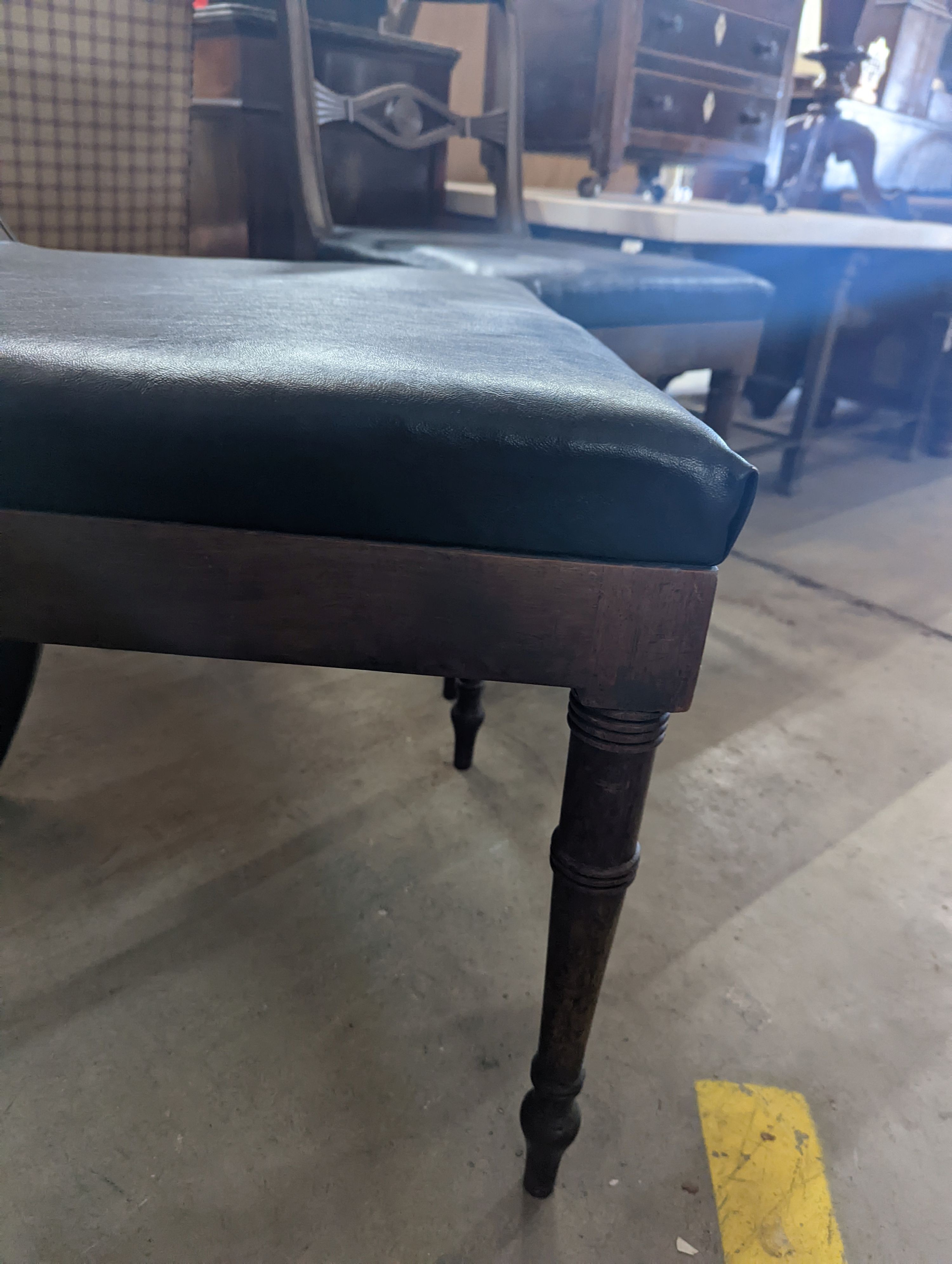 A pair of Regency mahogany dining chairs